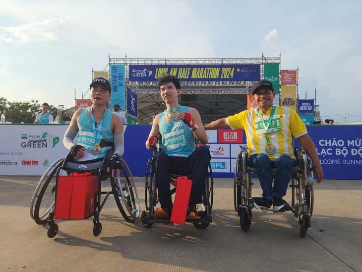 From left to right: To Dinh Khanh, Dang Hoang An, and Nguyen Quang Hung are cheerful after completing the GreenUP Marathon - Long An Half Marathon 2024